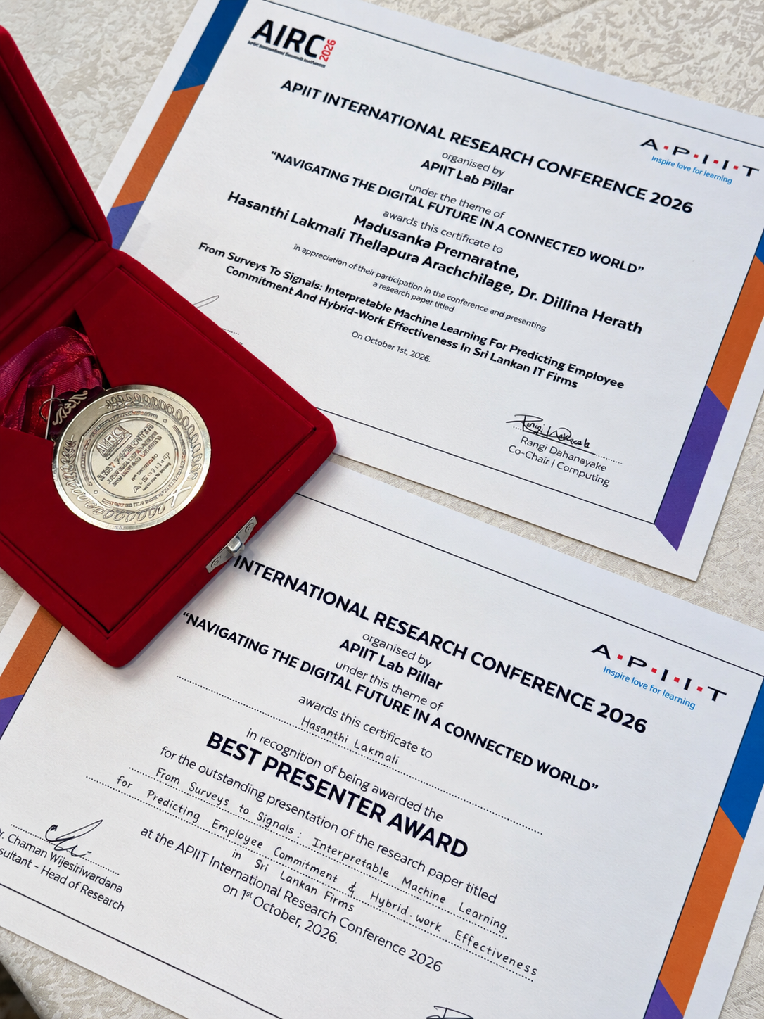 Hasanthi Lakmali's AIRC 2026 Best Presenter Award medal and certificates for the paper From Surveys to Signals, APIIT International Research Conference